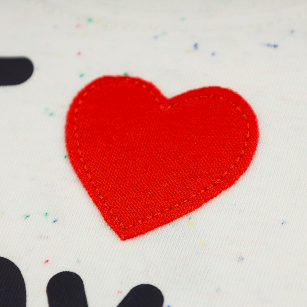 oh baby! Raw Edge Short Sleeve Tee - I Heart My Dog Applique - Confetti Oyster - Close Up of the heart