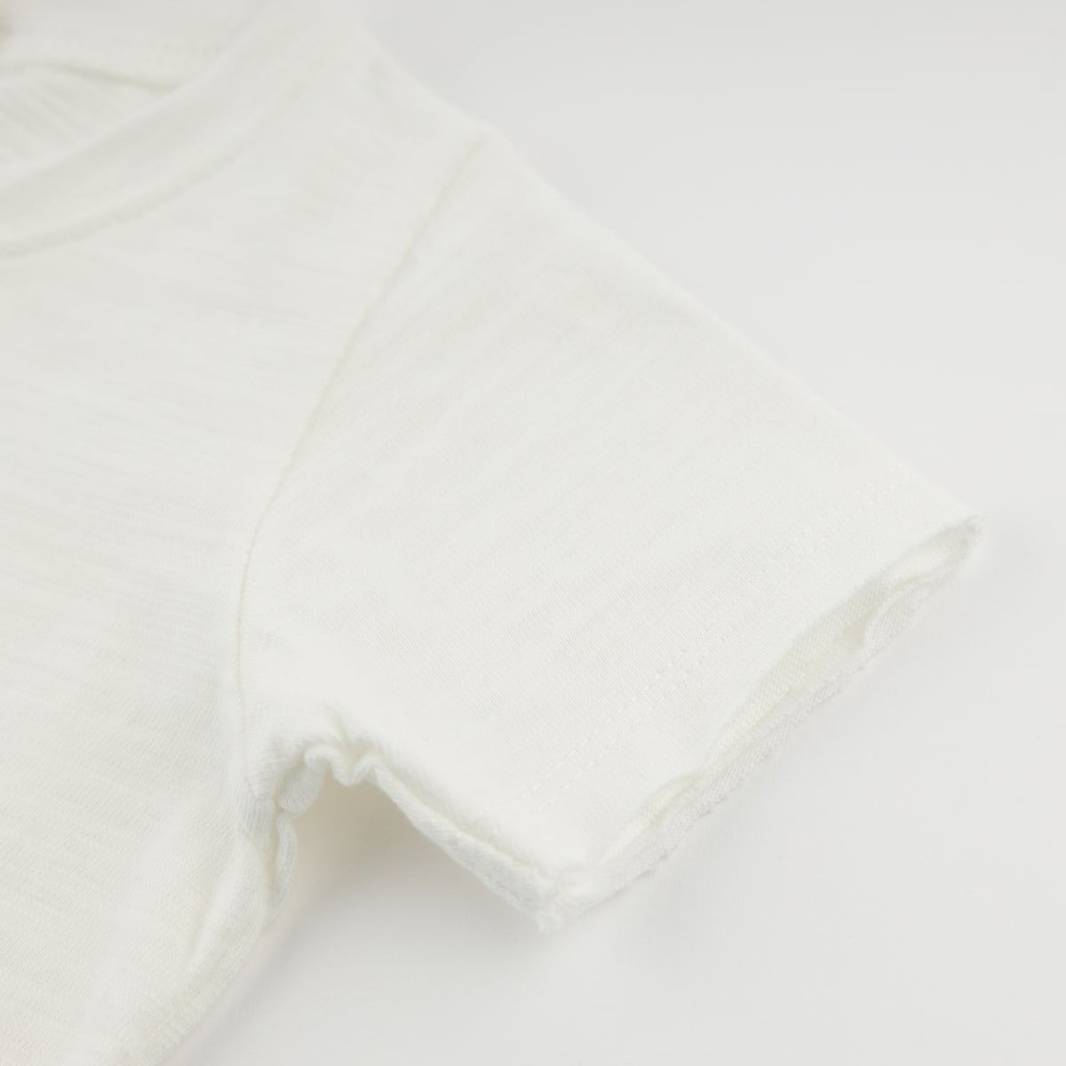 oh baby! Raw Edge Short Sleeve Tee - "Flower Child" Print - Oyster - Sleeve