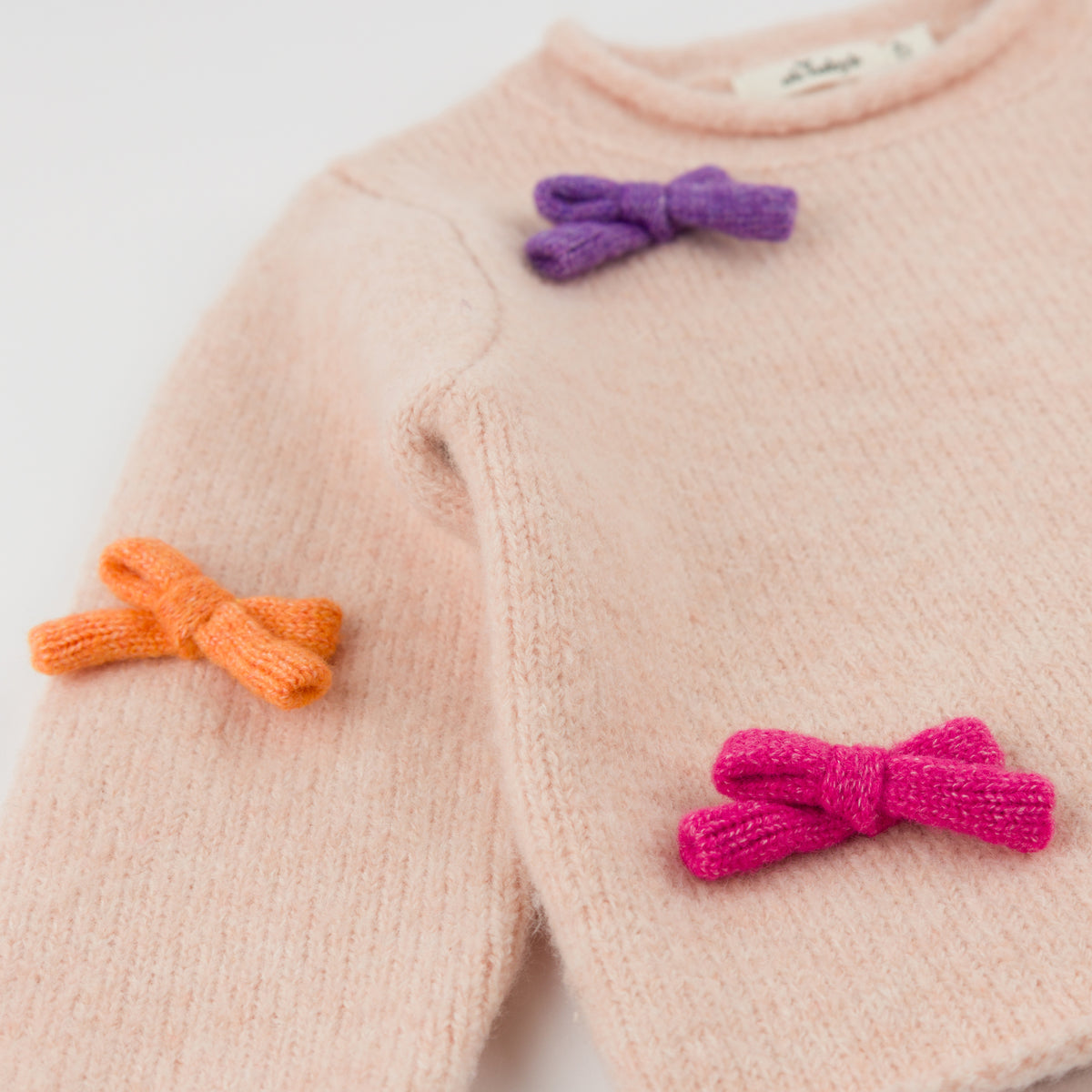 oh baby! Roll-Edge Knitted Pullover Sweater - Multi Bows - Pale Pink Heather - Close