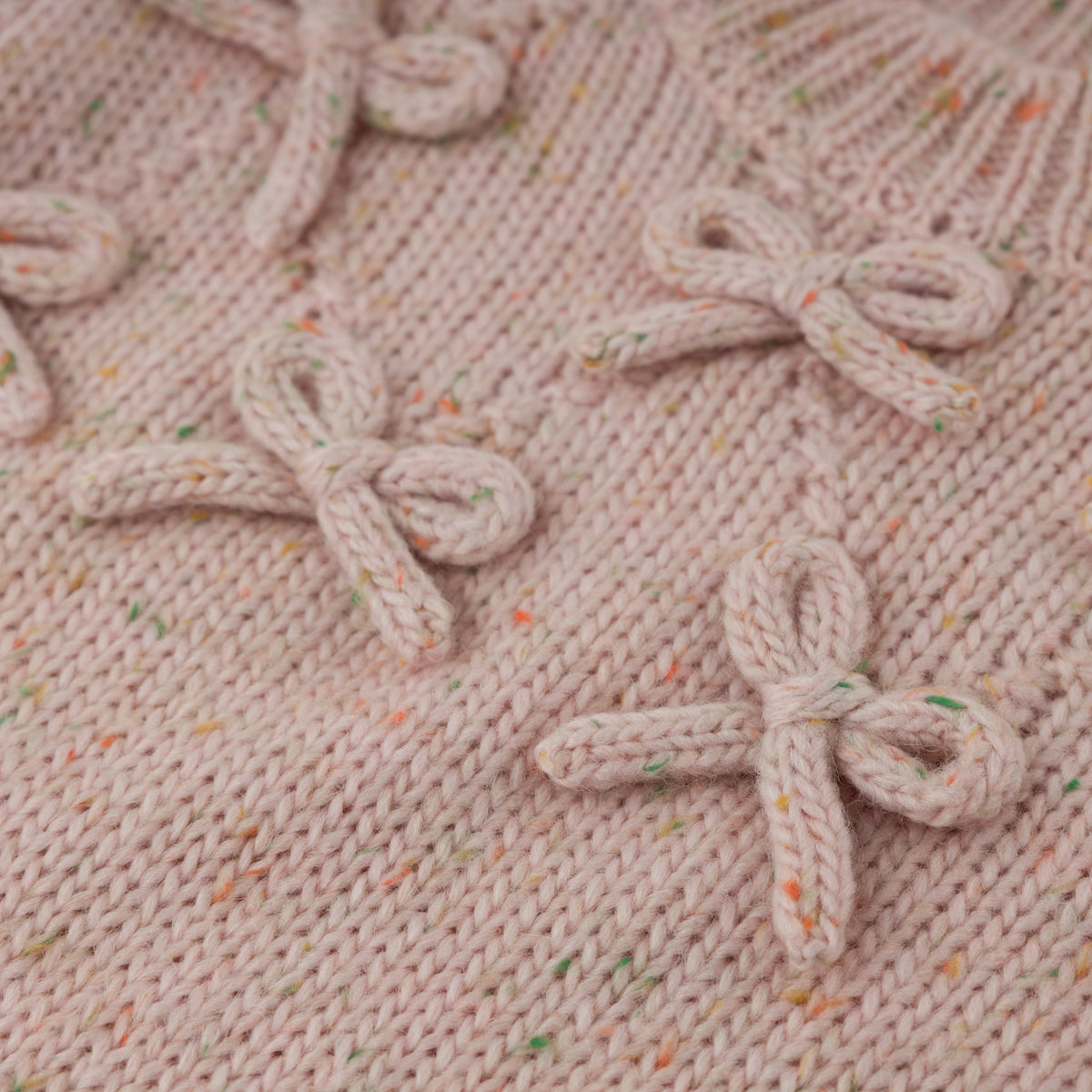 oh baby! Diamond Cable Knitted Sweater - Bows - Pale Pink Speckle - Close Up