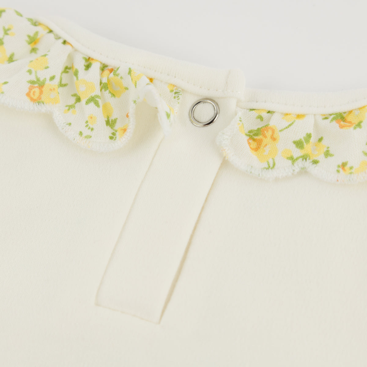 oh baby! Bella Bubble - Lemon Poppy Sprig Ruffle Bow - Oyster - back Snap