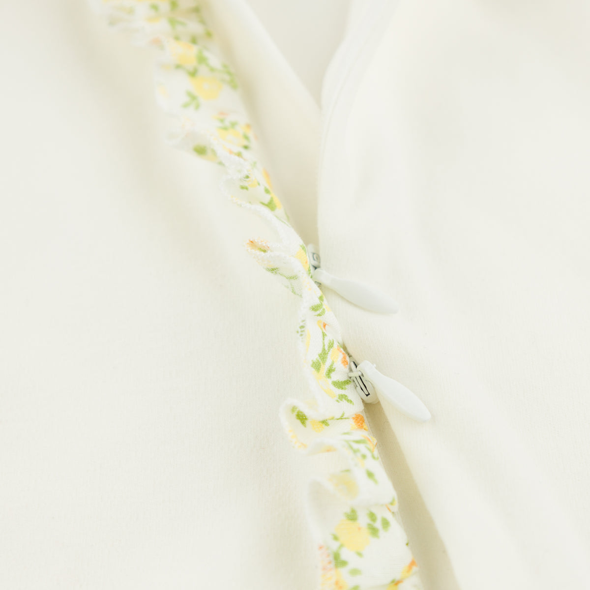 oh baby! Ruffle Footie - Lemon Poppy Sprig - Oyster - Close Up