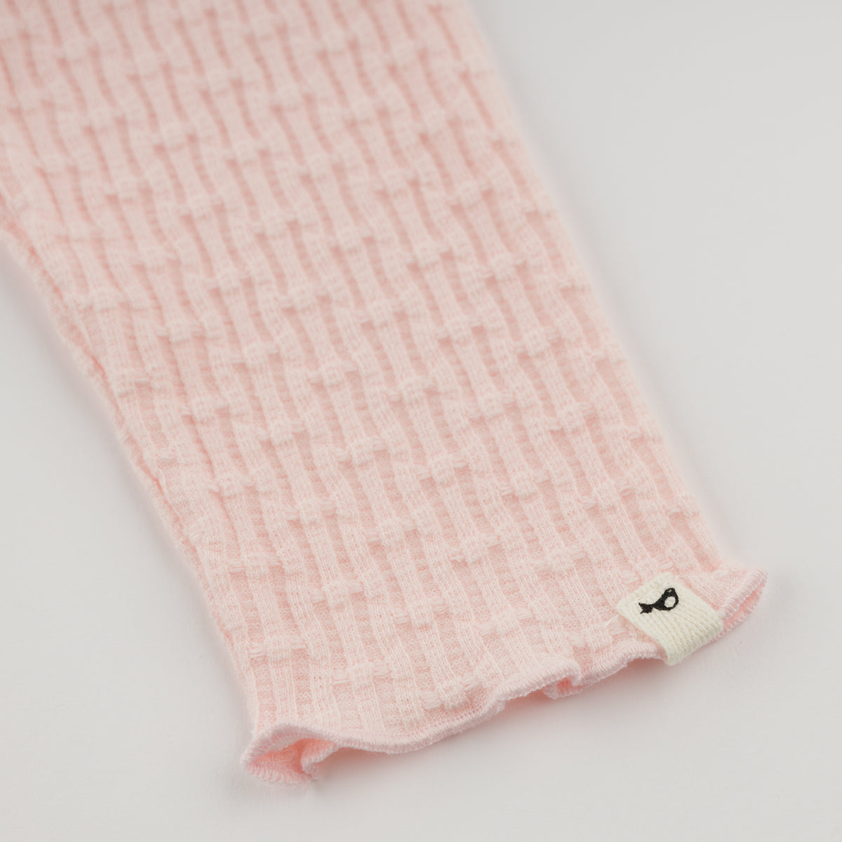 oh baby! Mini Rib Lettuce Edge Leggings - Barely Pink - Leg with logo