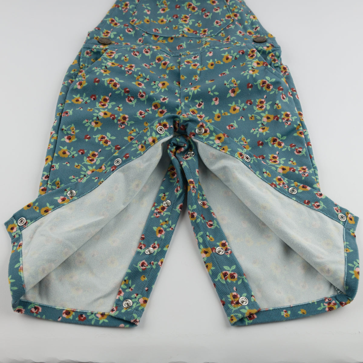 oh baby! Overalls - Harvest Bloom - Teal - Legs Close Up