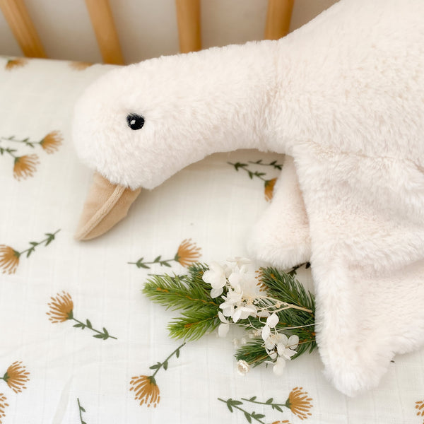 Pru Floppy Goose Stuffed Animal - Lifestyle in Crib