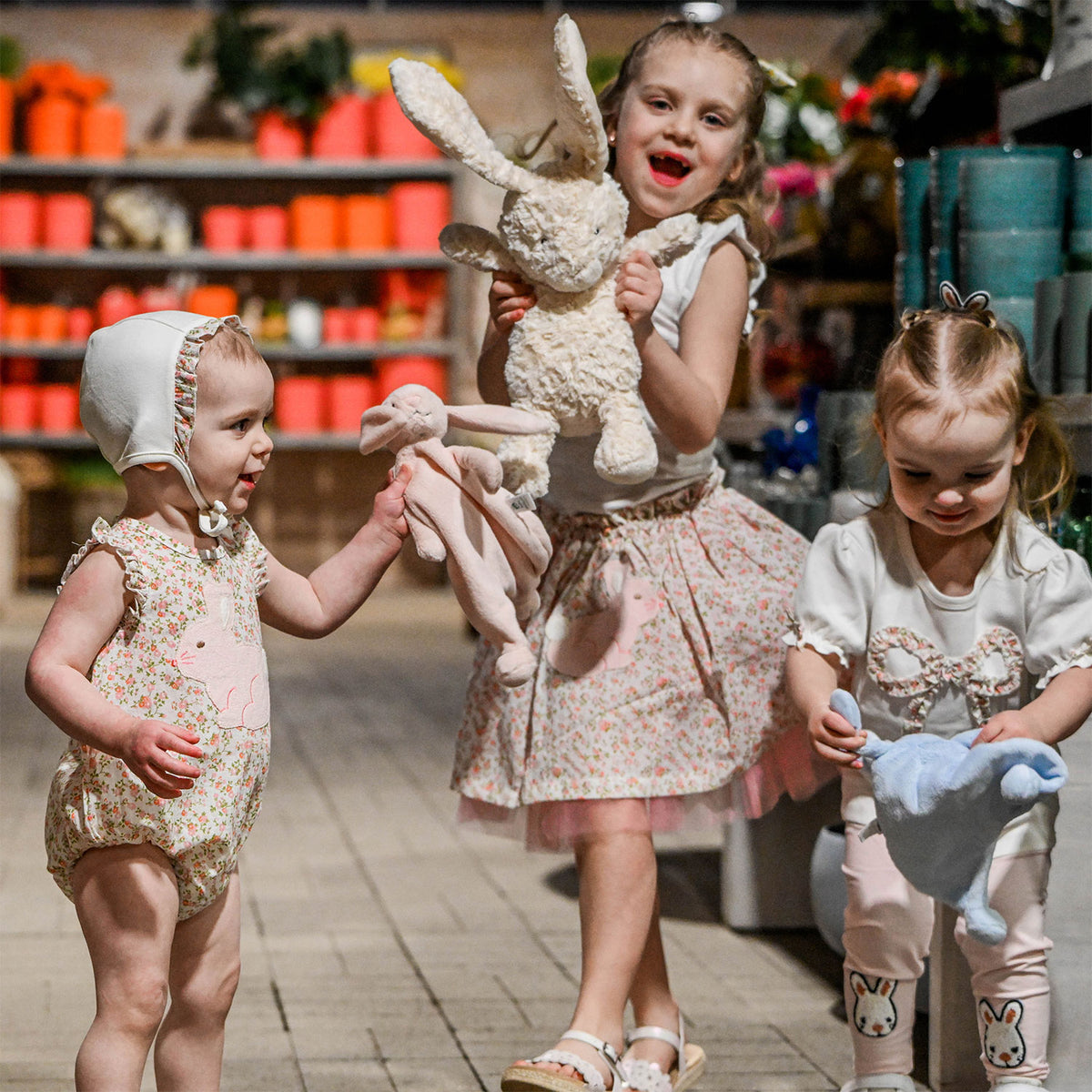 Blossoms and Bunnies Collection - Lifestyle playing with bunnies
